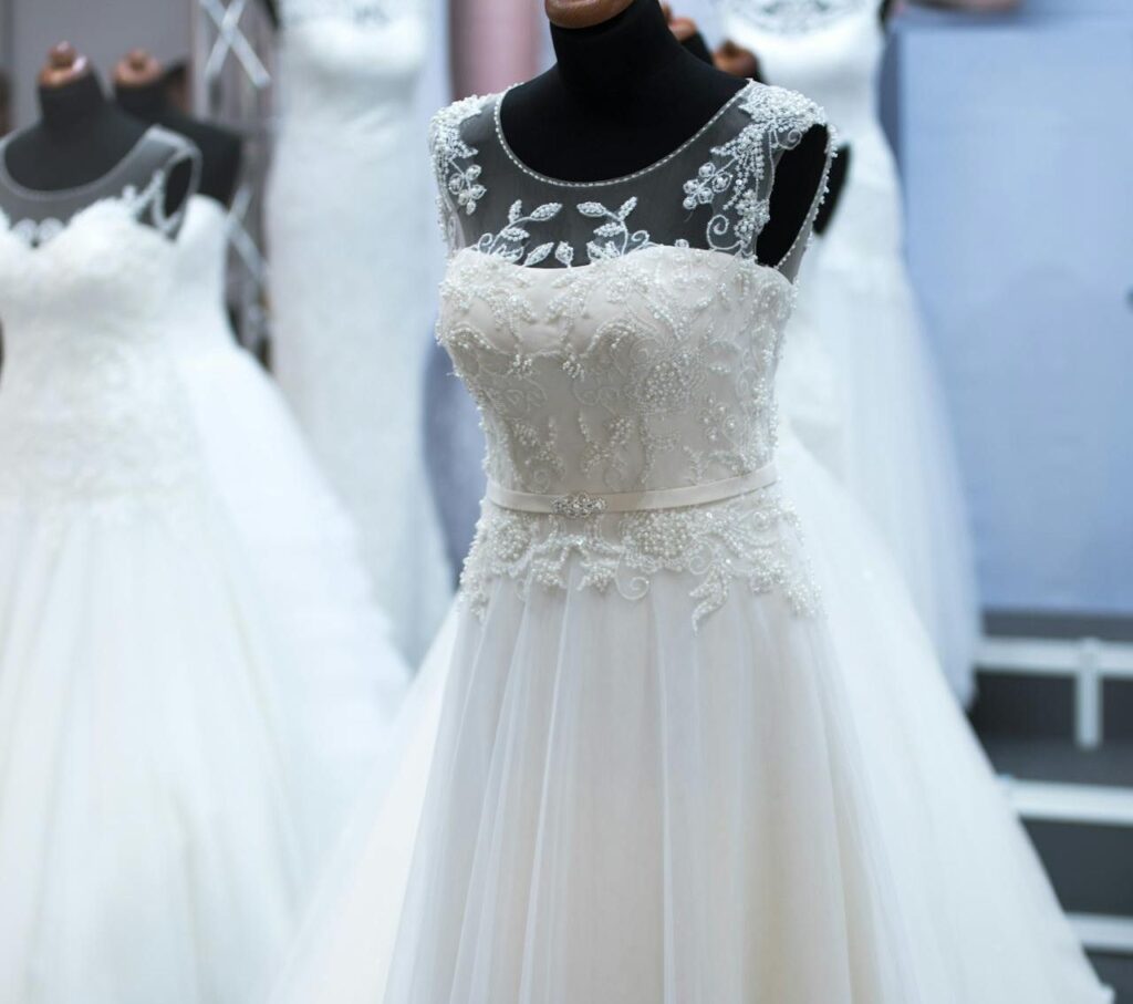 Wedding dresses on display in a store, perfect for a summer wedding guest dress in NZ